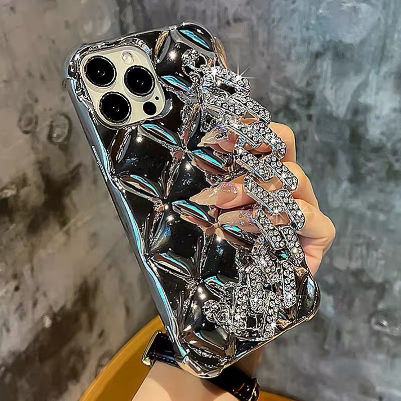 Funda de teléfono con pulsera incorporada decorada con diamantes de imitación de lujo.