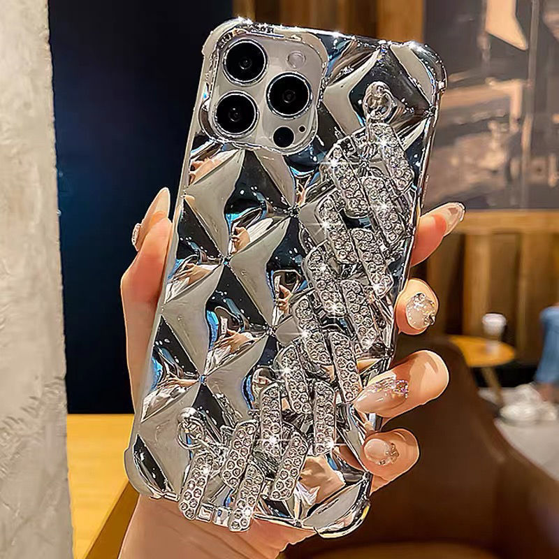 Funda de teléfono con pulsera incorporada decorada con diamantes de imitación de lujo.
