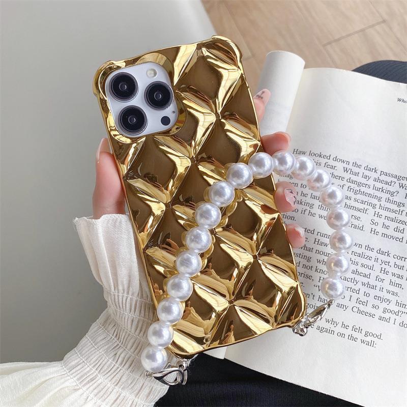 Funda de teléfono con pulsera incorporada decorada con diamantes de imitación de lujo.