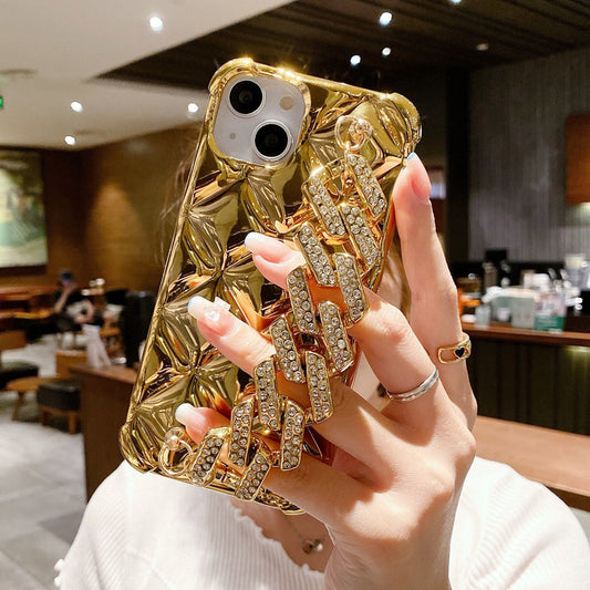 Funda de teléfono con pulsera incorporada decorada con diamantes de imitación de lujo.